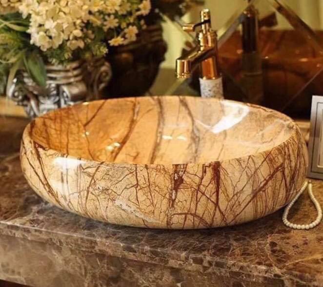 Chậu lavabo vân đá hình elip kích thước 30x50cm