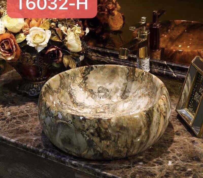 Chậu lavabo vân đá hình tròn