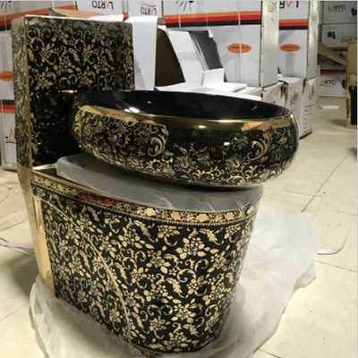 Bồn cầu khối đen hoa văn vàng siêu bóng